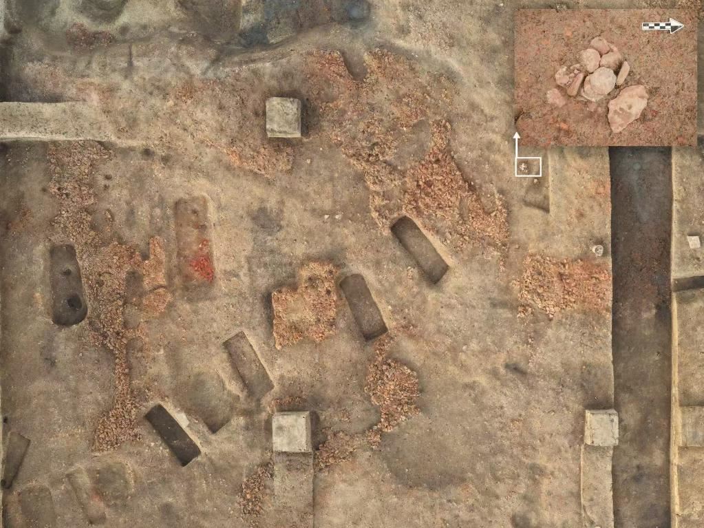 6000年前“制造业”雏形 无锡斗山遗址出土石纺轮作坊_新闻频道